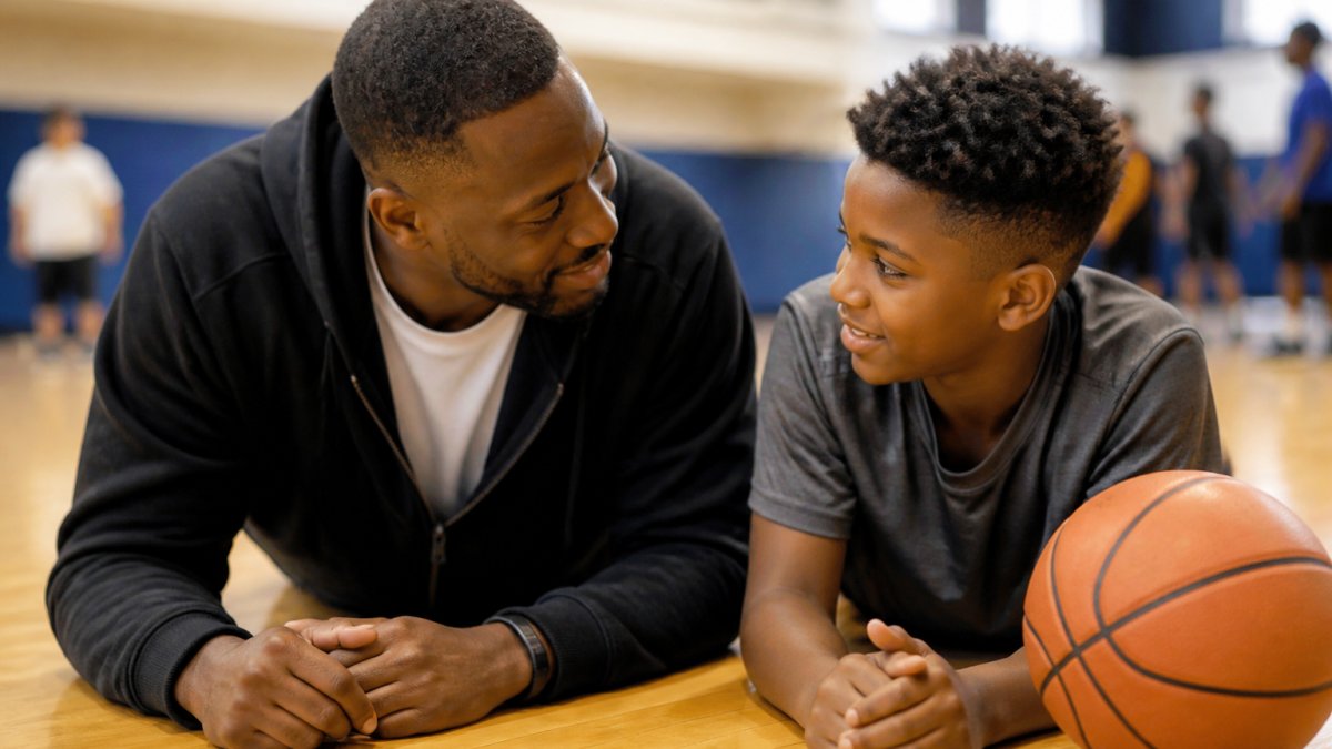 Adult mentor and teen boy in a focused conversation at after school programs for disconnected teens